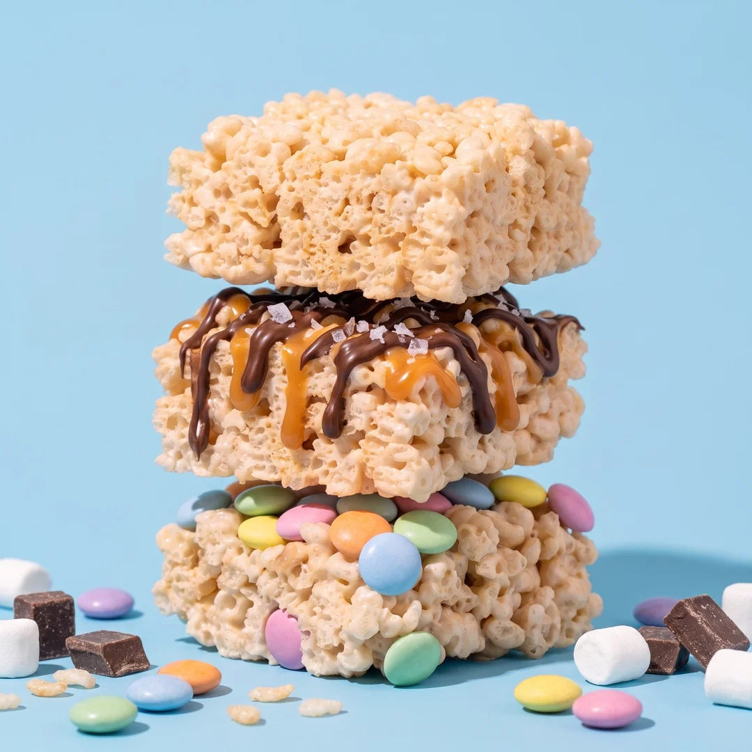 Stack of Classic, Chocolate Caramel and Rainbow Crispie Clusters